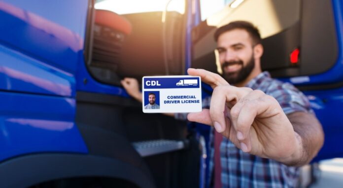 Man showing his driving license