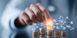 Hand stacking coins with digital network icons representing financial planning and healthcare optimization