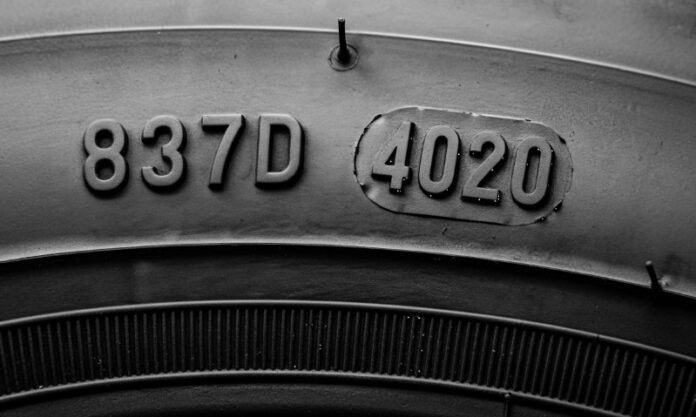 Close up view of a numbers on a truck's tire